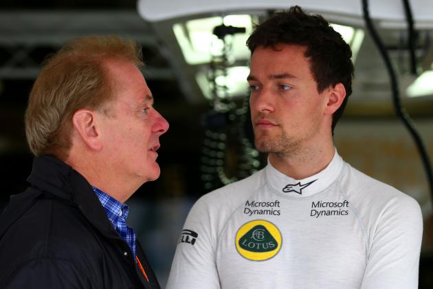SUZUKA, JAPAN - SEPTEMBER 25: Jolyon Palmer of Great Britain and Lotus speaks with his father Jonathan Palmer outside the team garage during practice for the Formula One Grand Prix of Japan at Suzuka Circuit on September 25, 2015 in Suzuka. (Photo by Mark Thompson/Getty Images)