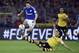 Schalke's Leon Goretzka, left, and Dortmund's Mats Hummels challenge for the ball during the German Bundesliga soccer match between Borussia Dortmund and FC Schalke 04 in Dortmund, Germany, Sunday, Nov. 8, 2015. (AP Photo/Martin Meissner)