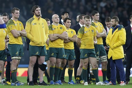 Australian players react after the Rugby World Cup final between New Zealand and Australia at Twickenham Stadium in London, Saturday, Oct. 31, 2015. (AP Photo/Tim Ireland)