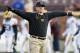 MINNEAPOLIS, MN - OCTOBER 31: Head coach Jim Harbaugh of the Michigan Wolverines looks on during warm-ups before the game against the Minnesota Golden Gophers on October 31, 2015 at TCF Bank Stadium in Minneapolis, Minnesota. (Photo by Hannah Foslien/Getty Images)