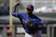 Texas Rangers' Jurickson Profar throws during a spring exhibition baseball game against the Kansas City Royals Saturday, March 22, 2014, in Surprise, Ariz. (AP Photo/Darron Cummings)