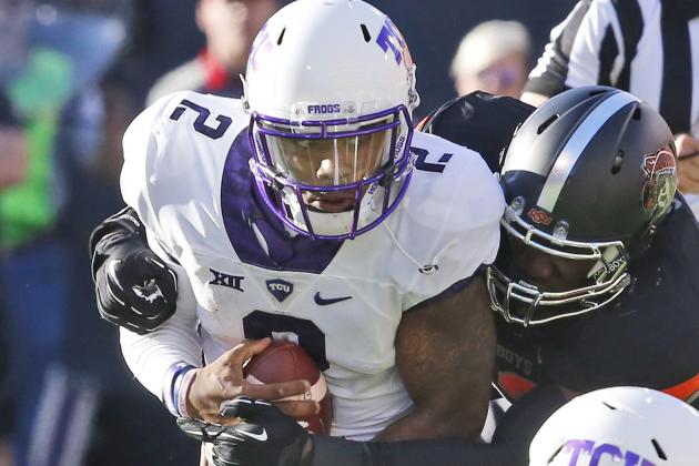 TCU quarterback Trevone Boykin (2) is sacked by Oklahoma State defensive end Jarrell Owens in the second quarter of an NCAA college football game in Stillwater, Okla., Saturday, Nov. 7, 2015. (AP Photo/Sue Ogrocki)