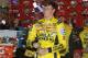 Erik Jones celebrates after winning the NASCAR Trucks auto race at Phoenix International Raceway in Avondale, Ariz., Friday, Nov. 7, 2014. The race was shortened because of two power outages. (AP Photo/Rick Scuteri)