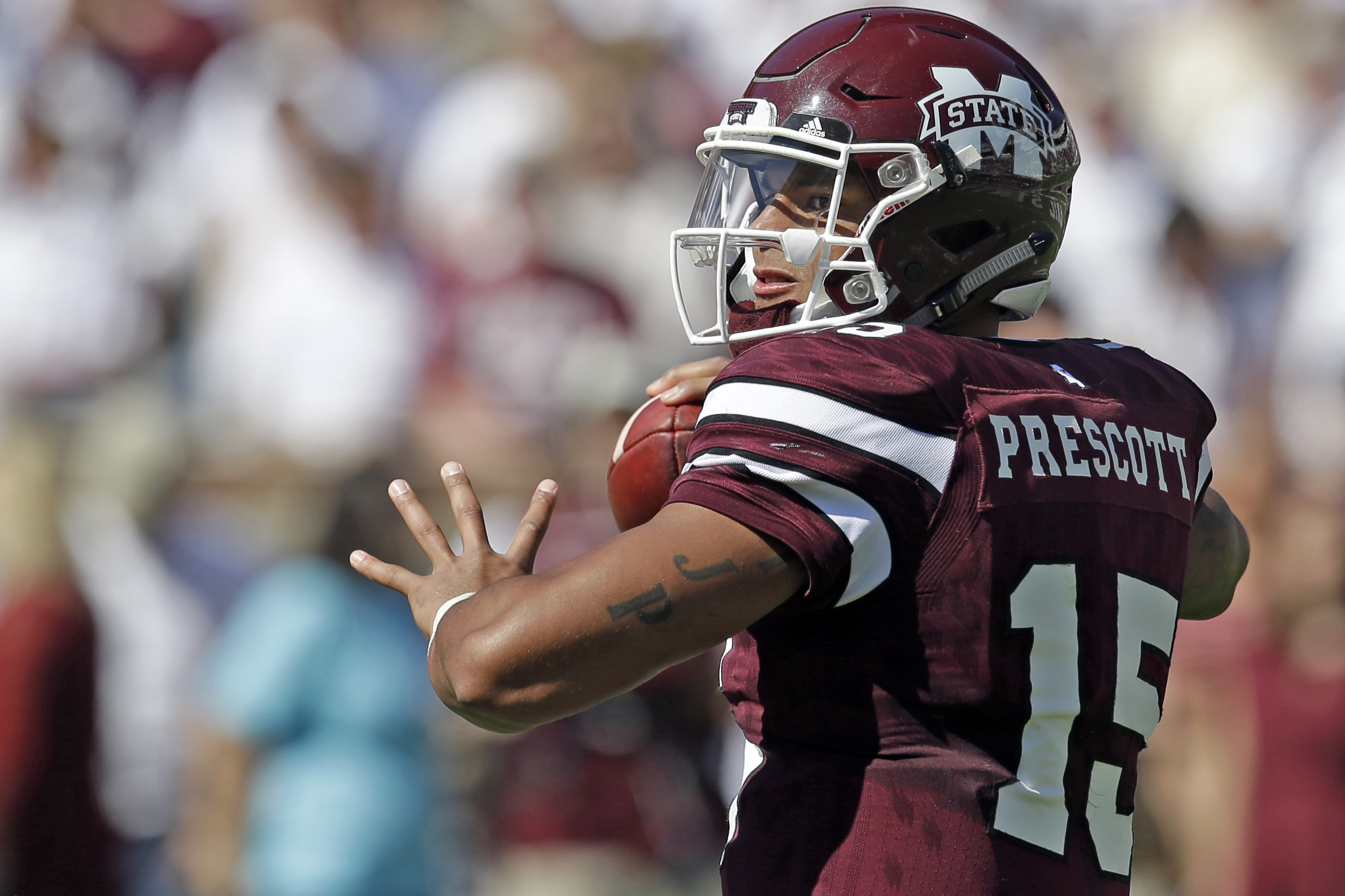 Dak Prescott Mississippi State Bulldogs Unsigned Maroon Jersey Close Up Photograph