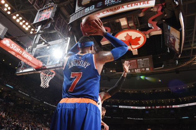 TORONTO, CA - NOVEMBER 10: Carmelo Anthony #7 of the New York Knicks looks to move the ball against the Toronto Raptors during the game on November 10, 2015 at Air Canada Centre in Toronto, Canada. NOTE TO USER: User expressly acknowledges and agrees that, by downloading and or using this Photograph, user is consenting to the terms and conditions of the Getty Images License Agreement. Mandatory Copyright Notice: Copyright 2015 NBAE (Photo by Ron Turenne/NBAE via Getty Images)