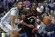 Toronto Raptors' Terrence Ross (31) drives past Boston Celtics' Evan Turner (11) during the fourth quarter of an NBA basketball game in Boston, Friday, Oct. 30, 2015. The Raptors won 113-103. (AP Photo/Michael Dwyer)