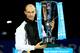 LONDON, ENGLAND - NOVEMBER 29: Nikolay Davydenko of Russia holds the trophy as he celebrates winning the men's singles final match against Juan Martin Del Potro of Argentina during the Barclays ATP World Tour Finals at the O2 Arena on November 29, 2009 in London, England. (Photo by Julian Finney/Getty Images)
