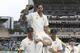 Australia's Mitchell Johnson is chaired off the ground after completing in his final test in the cricket test match against New Zealand in Perth, Australia, Tuesday, Nov.17, 2015. (AP Photo/Theron Kirkman)