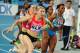 Belarus's Hanna Bahdanovich (L) hands the baton to Belarus's Yuliya Balykina during the 4x100 metres relay heats at the International Association of Athletics Federations (IAAF) World Championships in Daegu on September 4, 2011. AFP PHOTO / MARK RALSTON (Photo credit should read MARK RALSTON/AFP/Getty Images)