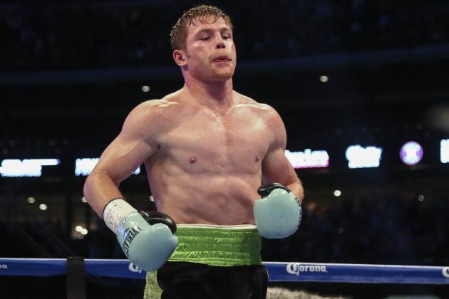 May 9, 2015; Houston, TX, USA; Canelo Alvarez goes to his corner after a knock down during a super welterweight bout against James Kirkland (not pictured) at Minute Maid Park. Alvarez defeated Kirkland with a knockout in the third round. Mandatory Credit: Troy Taormina-USA TODAY Sports