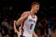 NEW YORK, NY - NOVEMBER 17: Kristaps Porzingis #6 of the New York Knicks celebrates after drawing the foul in the fourth quarter against the Charlotte Hornets at Madison Square Garden on November 17, 2015 in New York City.NOTE TO USER: User expressly acknowledges and agrees that, by downloading and/or using this photograph, user is consenting to the terms and conditions of the Getty Images License Agreement. (Photo by Elsa/Getty Images)