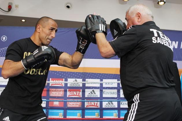 BERLIN, GERMANY - AUGUST 21:  Arthur Abraham (L) and his coach Uli Wegner practise during a public training session at Gropius Passagen on August 21, 2012 in Berlin , Germany.  (Photo by Boris Streubel/Getty Images)