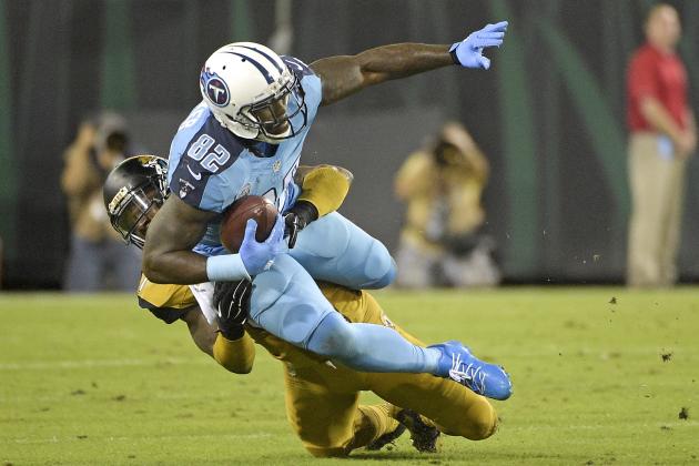 Tennessee Titans tight end Delanie Walker (82) is tackled by Jacksonville Jaguars strong safety Johnathan Cyprien after a short gain during the first half of an NFL football game in Jacksonville, Fla., Thursday, Nov. 19, 2015.(AP Photo/Phelan M. Ebenhack)