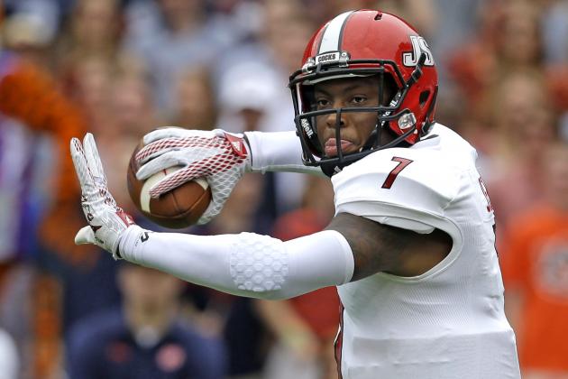 Jacksonville State quarterback Eli Jenkins (7) throws a pass during the first half of an NCAA college football game against Auburn, Saturday, Sept. 12, 2015, in Auburn, Ala. (AP Photo/Butch Dill)