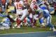 Kansas City Chiefs running back Spencer Ware, center, pushes past San Diego Chargers inside linebacker Manti Te'o (50) on his way to scoring a touchdown during the second half of an NFL football game Sunday, Nov. 22, 2015, in San Diego. (AP Photo/Denis Poroy)