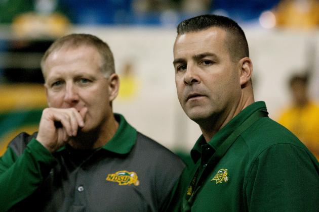 North Dakota State athletic director Matt Larsen, right and NDSU head football coach Chris Klieman confer before  an NCAA college football game against South Dakota Saturday, Oct. 17, 2015, in Fargo, N.D. (AP Photo/Bruce Crummy)