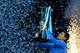 Serbia's Novak Djokovic holds up the ATP trophy after winning the men's singles final match against Switzerland's Roger Federer on day eight of the ATP World Tour Finals tennis tournament in London on November 22, 2015.
AFP PHOTO / GLYN KIRK (Photo credit should read GLYN KIRK/AFP/Getty Images)
