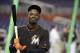 Miami Marlins second baseman Dee Gordon waits to bat during batting practice before a baseball game against the Atlanta Braves, Friday, Sept. 25, 2015, in Miami. (AP Photo/Lynne Sladky)