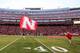 A large Nebraska flag is run across the field before an NCAA college football game between Nebraska and South Alabama in Lincoln, Neb., Saturday, Sept. 12, 2015. Nebraska won 48-9. (AP Photo/Nati Harnik)