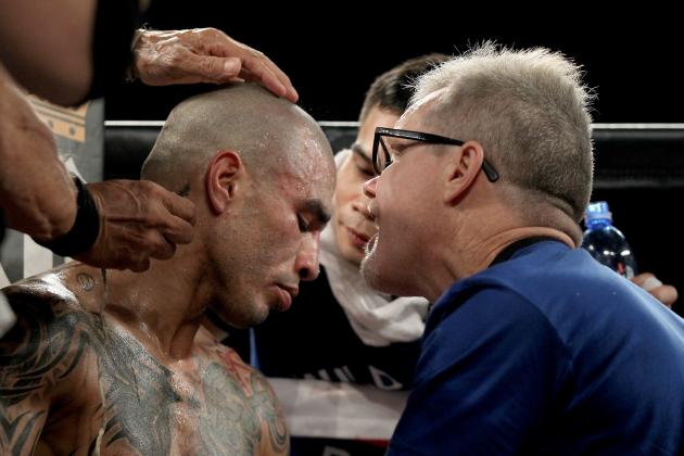 LAS VEGAS, NV - NOVEMBER 21: Miguel Cotto talks with trainer Freddie Roach as he takes on Canelo Alvarez during their middleweight fight at the Mandalay Bay Events Center on November 21, 2015 in Las Vegas, Nevada. (Photo by Isaac Brekken/Getty Images)