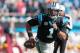 Nov 22, 2015; Charlotte, NC, USA; Carolina Panthers quarterback Cam Newton (1) carries the ball during the second quarter against the Washington Redskins at Bank of America Stadium. Mandatory Credit: Jeremy Brevard-USA TODAY Sports