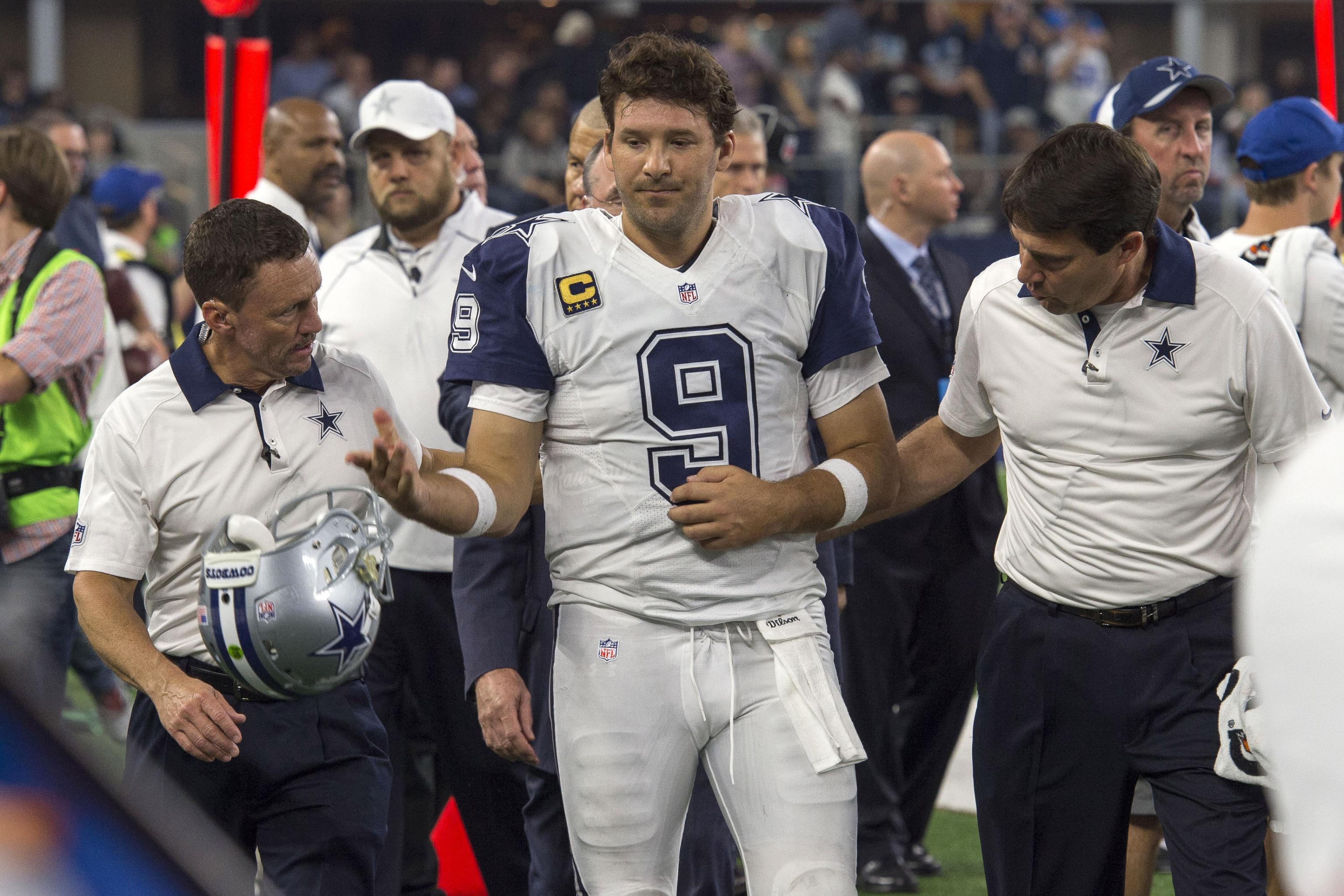 Tony Romo injured as Panthers beat Cowboys to move to 11-0, NFL