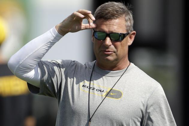 Missouri quarterbacks coach Andy Hill on the field during the team's first NCAA college football practice of the season Thursday, Aug. 1, 2013, in Columbia, Mo. (AP Photo/Jeff Roberson)