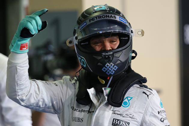 Mercedes AMG Petronas F1 Team's German driver Nico Rosberg celebrates after the qualifying session at the Yas Marina circuit in Abu Dhabi on November 28, 2015 ahead of the Abu Dhabi Formula One Grand Prix. Rosberg will start from pole position in the final Grand Prix of the season in Abu Dhabi after coming home fastest in qualifying.   AFP PHOTO / MARWAN NAAMANI / AFP / MARWAN NAAMANI        (Photo credit should read MARWAN NAAMANI/AFP/Getty Images)