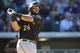 Pittsburgh Pirates first baseman Pedro Alvarez (24) bats against the Colorado Rockies in the sixth inning of a baseball game Thursday, Sept. 24, 2015, in Denver. Pittsburgh won 5-4. (AP Photo/David Zalubowski)