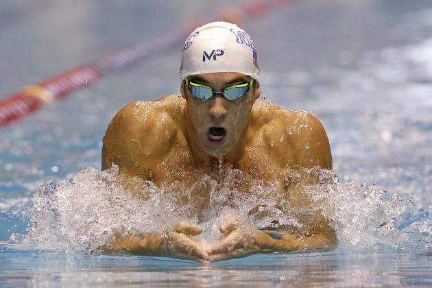 Michael Phelps swims the breaststroke leg of the men's 200 meter individual medley in a preliminary race at the U.S. Winter Nationals swimming event Thursday, Dec. 3, 2015, in Federal Way, Wash. (AP Photo/Elaine Thompson)