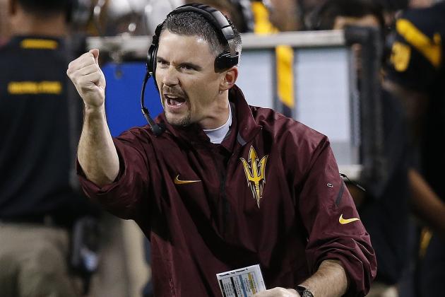 Arizona State offensive coordinator Mike Norvell cheers on his offensive unit during the first half of an NCAA college football game against Arizona Saturday, Nov. 30, 2013, in Tempe, Ariz. (AP Photo/Ross D. Franklin)