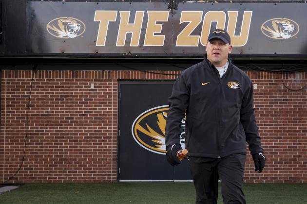 Missouri defensive coordinator Barry Odom walks on the field before the start of their NCAA college football game against Tennessee Saturday, Nov. 21, 2015, in Columbia, Mo. (AP Photo/L.G. Patterson)