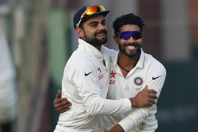 Indian spinner Ravindra Jadeja, right, is hugged by team captain Virat Kohli after he took the wicket of South African batsman Dane Piedt, on the second day of the fourth test match between the two countries, in New Delhi, India, Friday, Dec. 4, 2015. (AP Photo /Tsering Topgyal)