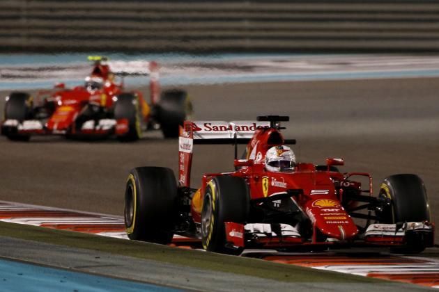 Ferrari's German driver Sebastian Vettel (R) and Ferrari's Finnish driver Kimi Raikkonen race during the Abu Dhabi Formula One Grand Prix at the Yas Marina circuit on November 29, 2015. AFP PHOTO / KARIM SAHIB / AFP / ANDREJ ISAKOVIC (Photo credit should read ANDREJ ISAKOVIC/AFP/Getty Images)