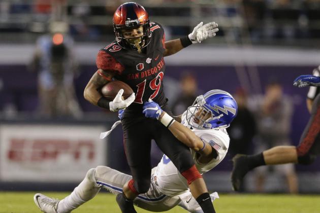 San Diego State running back Donnel Pumphrey gets past Air Force defensive back Brodie Hicks during the first half of the NCAA Mountain West Championship football game Saturday, Dec. 5, 2015, in San Diego. (AP Photo/Gregory Bull)