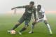 Celtic's Jason Denayer, left, challenges for the ball with Astra's Sadat Bukari during a Europa League Group D soccer match between Astra Giurgiu and Celtic, in Giurgiu, Romania, Thursday, Nov. 6, 2014.(AP Photo/Octav Ganea, Mediafax) ROMANIA OUT