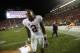 Alabama running back Derrick Henry (2) smiles at Auburn defensive back Tray Matthews (28) during the end of an NCAA college football game, Saturday, Nov. 28, 2015, in Auburn, Ala. Alabama won 29-13. (AP Photo/Gerald Herbert)