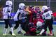 Chinese youths take part in a Youth Tackle Football game at a National Football League publicity event held in Beijing, China, Friday, Oct. 23, 2015. The NFL has been aggressively promoting football in China hoping to take advantage of rising income and growing taste for exotic foreign sports. (AP Photo/Ng Han Guan)