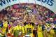LONDON, ENGLAND - MAY 30: Mathieu Flamini of Arsenal lifts the trophy in celebration with team mates after the FA Cup Final between Aston Villa and Arsenal at Wembley Stadium on May 30, 2015 in London, England. Arsenal beat Aston Villa 4-0. (Photo by Clive Rose/Getty Images)