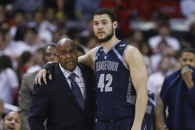 Georgetown head coach John Thompson III, left, speaks with center Bradley Hayes in the second half of an NCAA college basketball game against Maryland, Tuesday, Nov. 17, 2015, in College Park, Md. (AP Photo/Patrick Semansky)