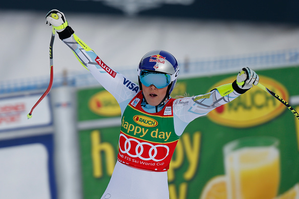 Lindsey Vonn of the US celebrates winning the Super G at the Ski World Cup 2015-2016 in Lake Louise, Canada, on December 6, 2015.  AFP PHOTO/STR / AFP / STR        (Photo credit should read STR/AFP/Getty Images)