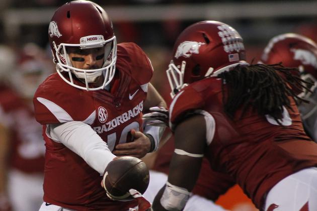 Arkansas' Brandon Allen (10) hands off to Alex Collins (3) during the second half of an NCAA college football game against Tennessee-Martin, Saturday, Oct. 31, 2015, in Fayetteville, Ark. Arkansas won 63-28. (AP Photo/Samantha Baker)