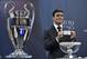 UEFA Champions League final ambassador Javier Zanetti shows the name of Athletico Madrid football club during the draw for the UEFA Champions league round of sixteen, on December 14, 2015 at the UEFA headquarters in Nyon. AFP PHOTO / FABRICE COFFRINI / AFP / FABRICE COFFRINI (Photo credit should read FABRICE COFFRINI/AFP/Getty Images)