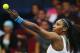 Serena Williams serves during an 2015 IPTL event.