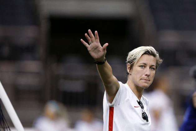 U.S. forward Abby Wambach waves to fans at the end of a practice session Tuesday, Dec. 15, 2015, in New Orleans for Wednesday's final U.S. victory tour match, against China. Wambach will be playing in her final match with the team. (AP Photo/Gerald Herbert)