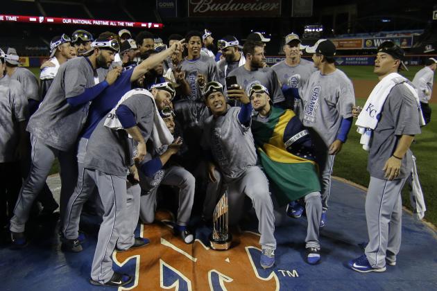 Kansas City Royals pose with World Series trophy after Game 5 of the Major League Baseball World Series against the New York Mets Monday, Nov. 2, 2015, in New York. The Royals won 7-2 to win the series. (AP Photo/Matt Slocum)