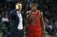 Chicago Bulls head coach Fred Hoiberg, left, talks with Jimmy Butler (21) during the second half of an NBA basketball game against the Boston Celtics in Boston, Wednesday, Dec. 9, 2015. The Celtics won 105-100. (AP Photo/Michael Dwyer)