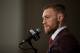 LAS VEGAS, NV - DECEMBER 12: UFC featherweight champion Conor McGregor speaks to the media at the post fight press conference after his 13 second knockout victory over Jose Aldo in their featherweight championship fight during the UFC 194 event inside MGM Grand Garden Arena on December 12, 2015 in Las Vegas, Nevada. (Photo by Brandon Magnus/Zuffa LLC/Zuffa LLC via Getty Images)