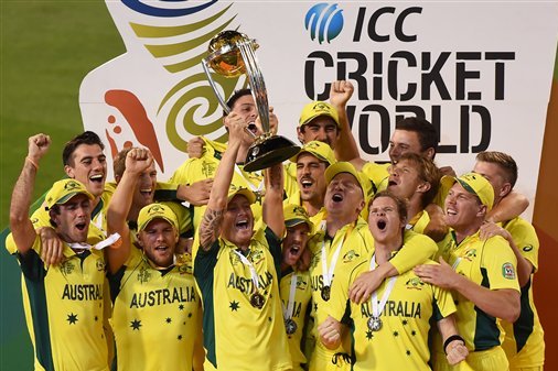 Australian captain Michael Clarke holds aloft the trophy with his teammates as they celebrate their seven wicket win over New Zealand in the Cricket World Cup final in Melbourne, Australia, Sunday, March 29, 2015. (AP Photo/Andy Brownbill)