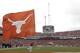A Texas longhorn flag is carried across the field during the first half of an NCAA college football game against the Oklahoma at the Cotton Bowl Saturday, Oct. 12, 2013, in Dallas. (AP Photo/Brandon Wade)